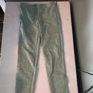 Grey leggings with sparkles on them